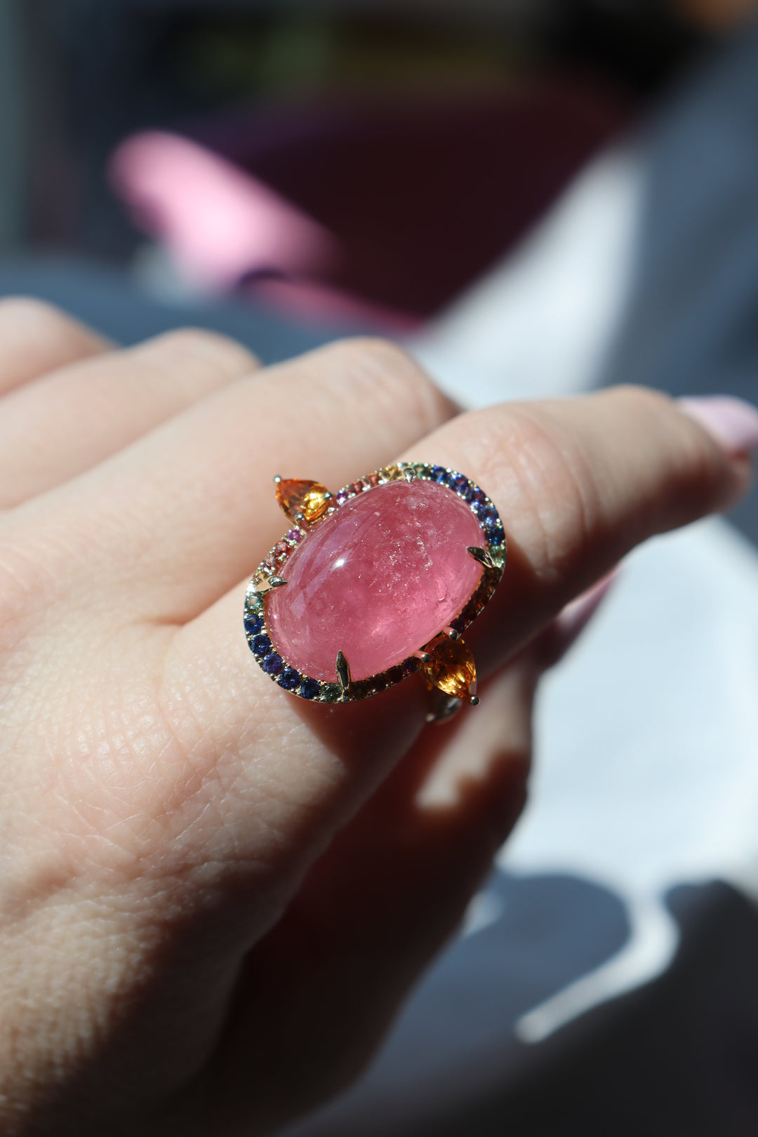17.30ct Pink Tourmaline Cabochon, Spessartite Garnet, Rainbow Sapphire, & Diamond Ring in 18K Yellow Gold