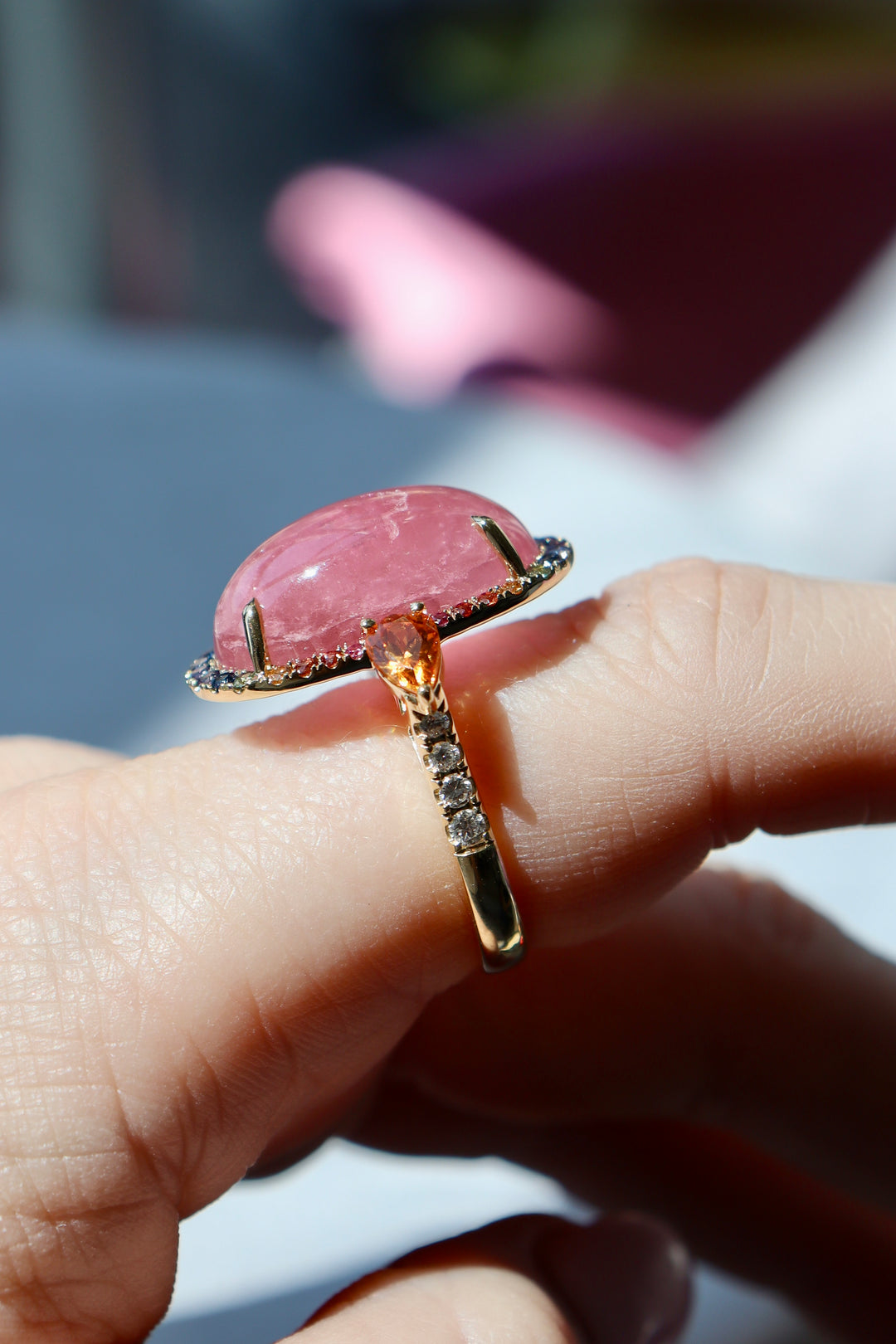 17.30ct Pink Tourmaline Cabochon, Spessartite Garnet, Rainbow Sapphire, & Diamond Ring in 18K Yellow Gold