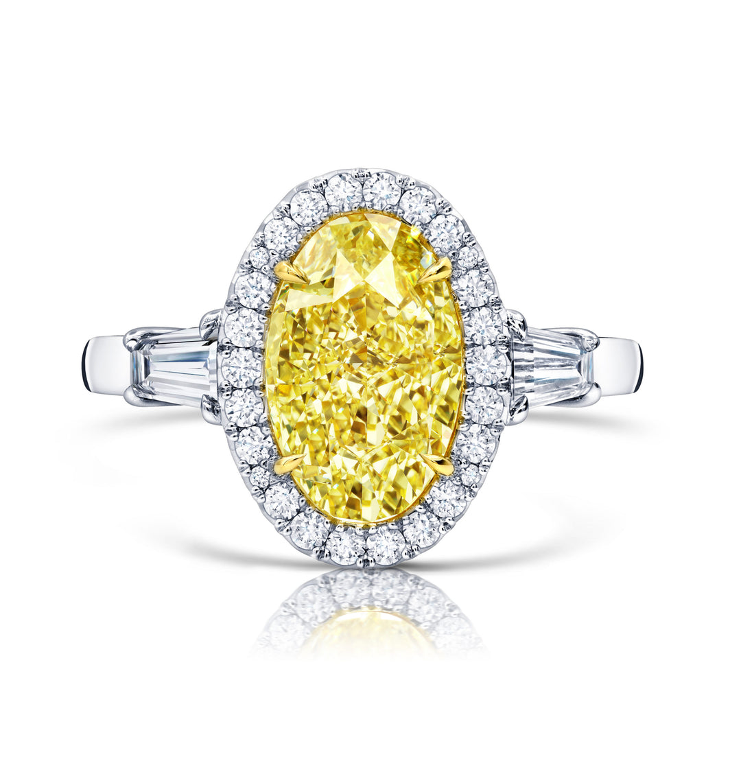 Oval Fancy Yellow Diamond Three-Stone Ring