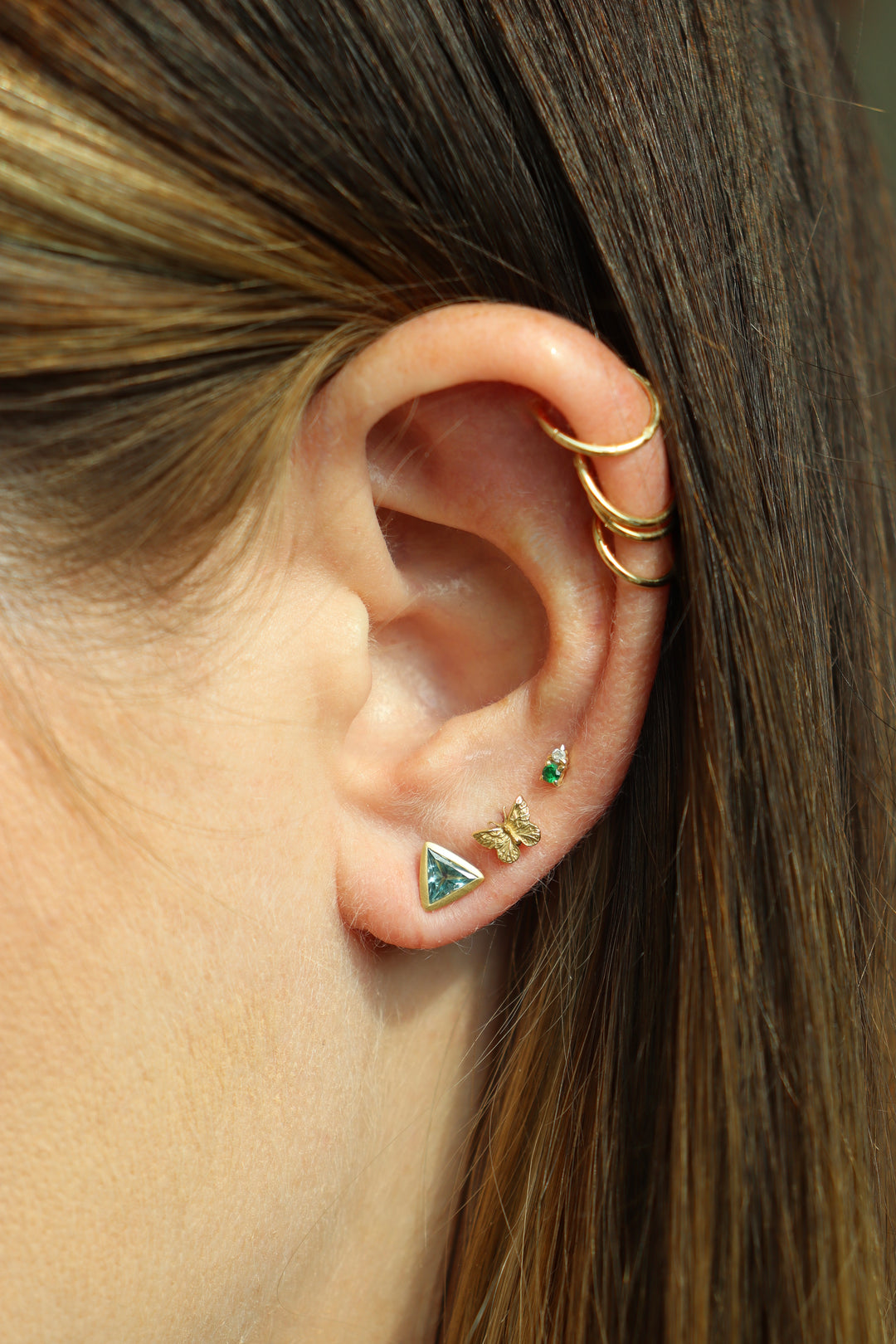 1.00ctw Trillion Blue Zircon Mini Studs Bezel set in 18K Yellow Gold