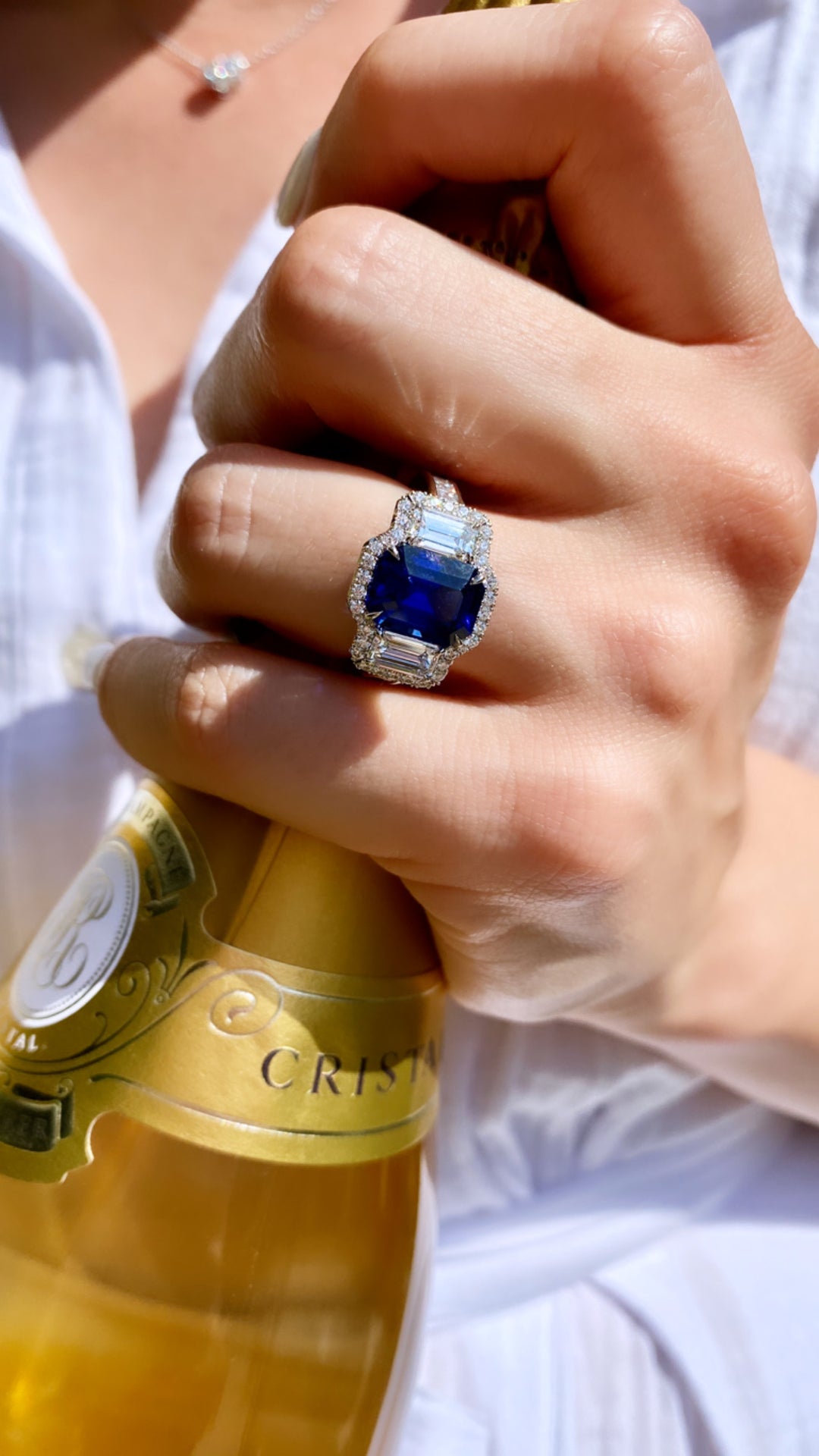 Emerald Cut Sapphire & Diamond Three Stone Ring