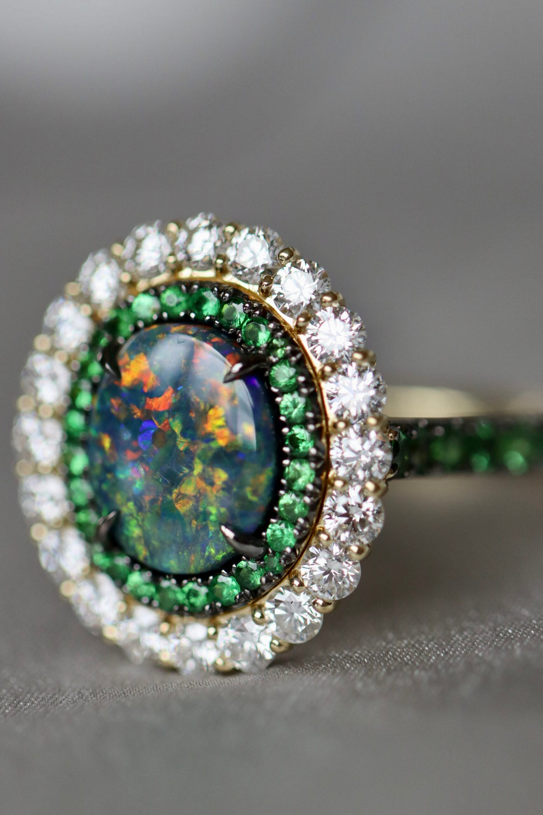 "A Kaleidoscope of Green" 2023 AGTA Award Winning 2.15ct Oval Australian Black Opal, Tsavorite, & Diamond Ring