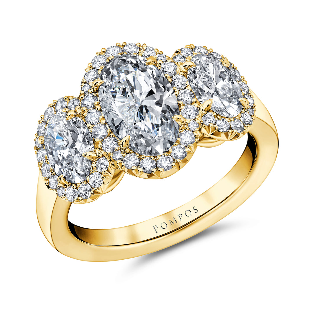 Oval Diamond Halo Three Stone Ring in 18K Yellow Gold