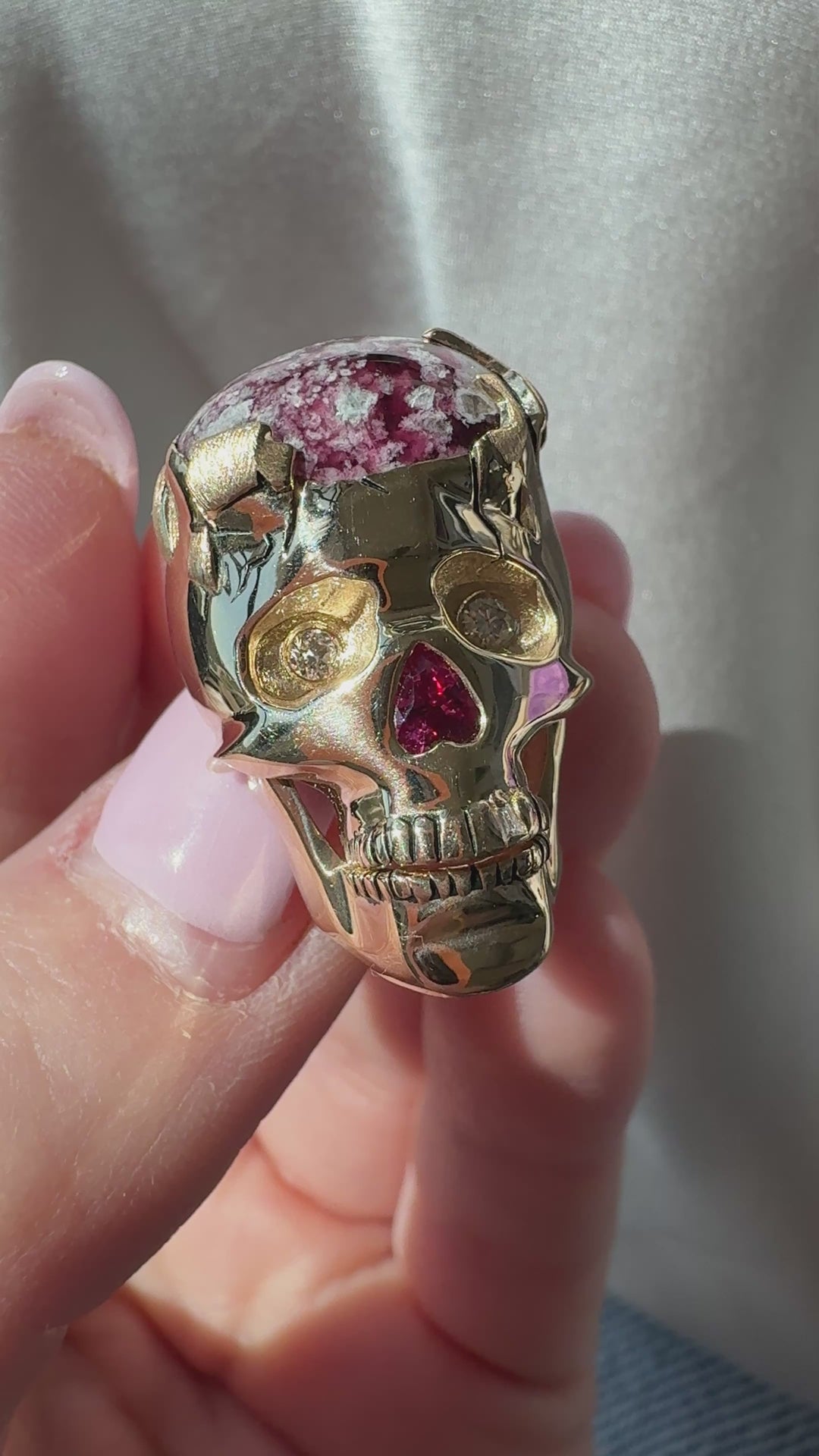 “Skullchemy, the Cranium of Fire:" 14K Yellow Gold Red Beryl, Ruby and Diamond Skull Brooch